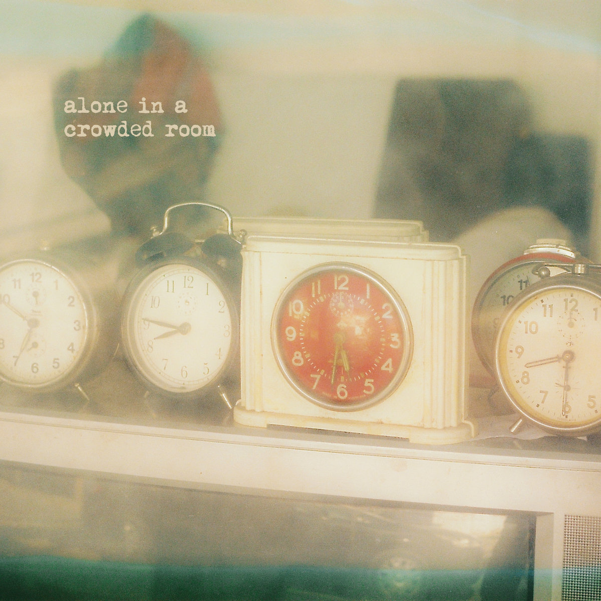 alone in a crowded room cover art